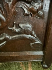 Carved snail on each side.